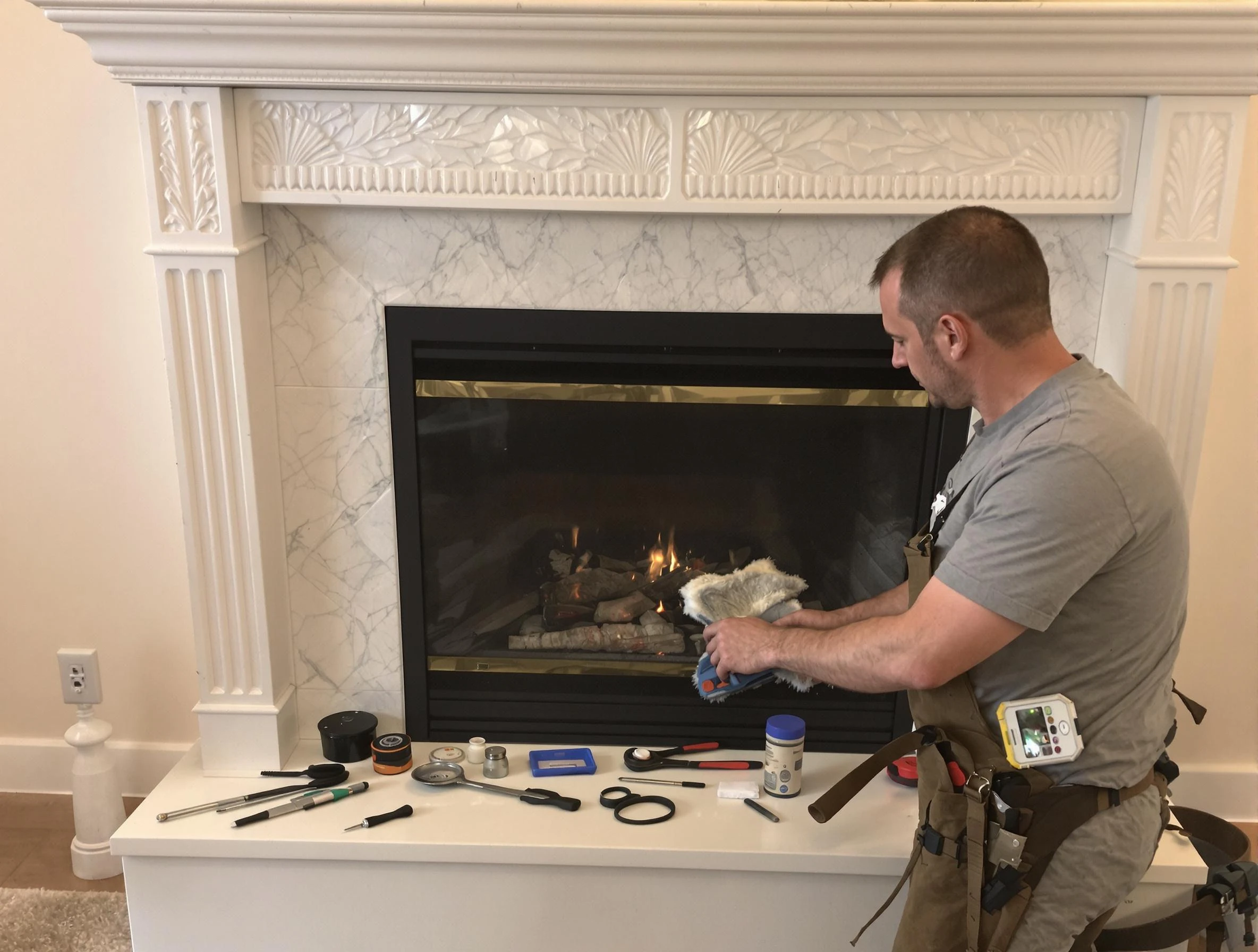 Arlington Chimney Sweep performing fireplace maintenance in Arlington, MA